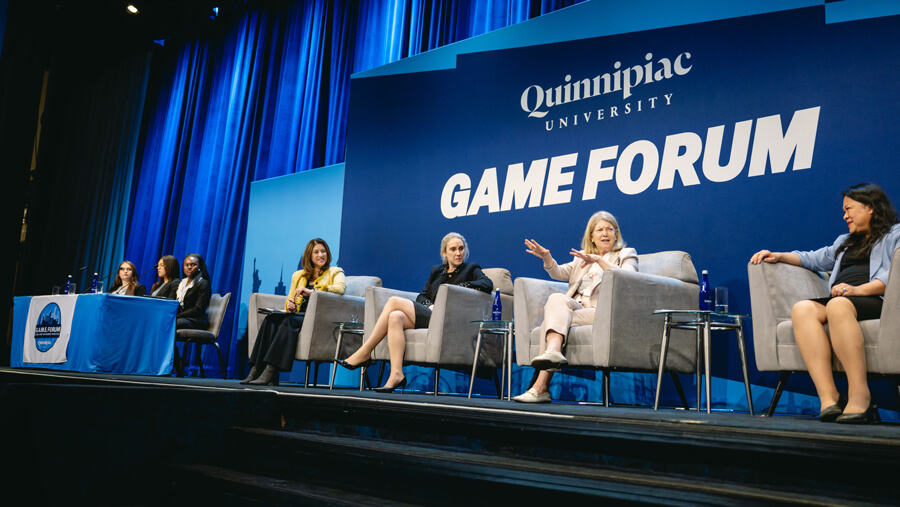 Speakers presenting a keynote panel discussion at GAME Forum XIV