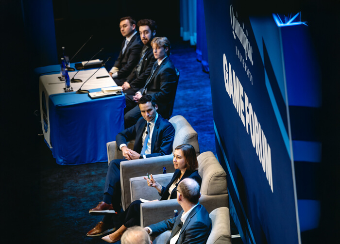 Panelists host a keynote presentation at GAME Forum.