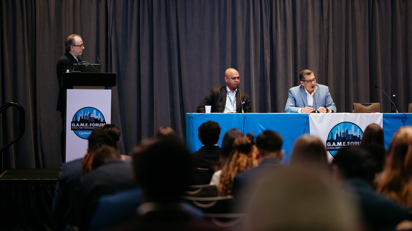 Panelists make a keynote presentation on A.I. at GAME Forum.