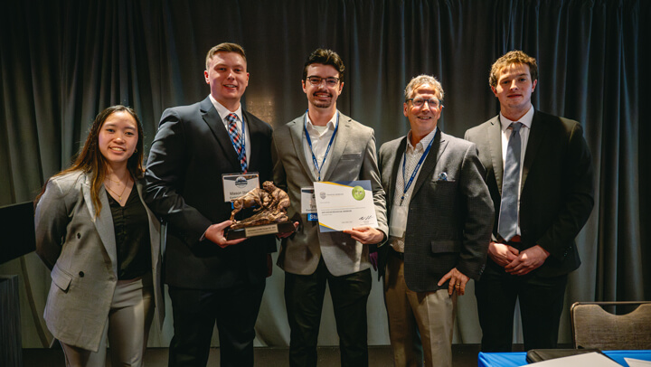 Undergraduate Growth category awardees gather for a group photo on stage at the GAME Forum Poster Competition Awards Ceremony.