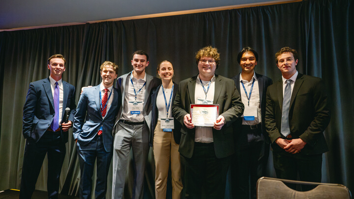 Students recognized as awardees in the Undergraduate Fixed Income category pose with their award during the GAME Forum Poster Competition Awards Ceremony.