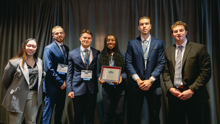 Undergraduate Growth category awardees gather for a group photo on stage at the GAME Forum Poster Competition Awards Ceremony.
