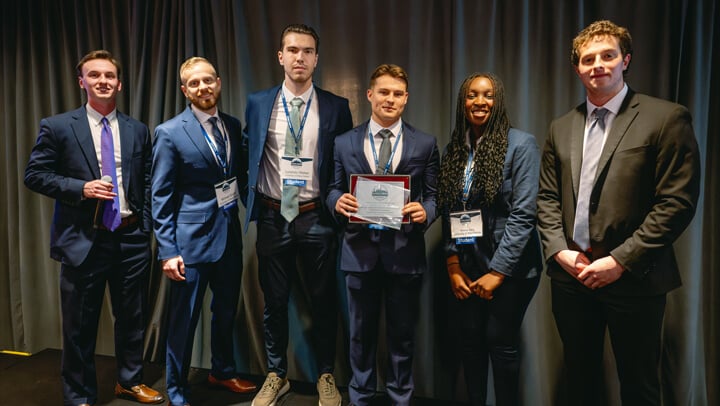 Students recognized as awardees in the Undergraduate Fixed Income category pose with their award during the GAME Forum Poster Competition Awards Ceremony.