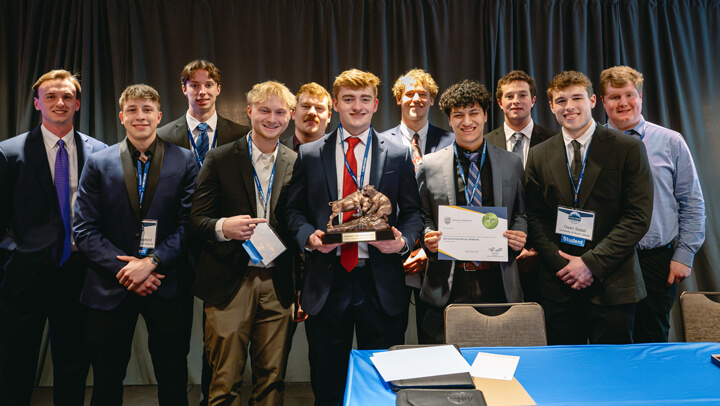 Students recognized as awardees in the Undergraduate Fixed Income category pose with their award during the GAME Forum Poster Competition Awards Ceremony.