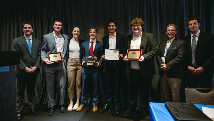 Poster Session awardees gather on stage with their award at the GAME Forum Awards Ceremony.